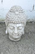 A 20th century stone garden bust of Buddha,