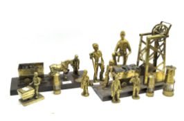 A Welsh coalmining sculpture and assorted lamps,