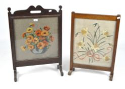 Two 20th century wooden framed fire screens,