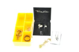 A collection of silver and yellow metal jewellery, including a pair of Thomas Sabor earrings,