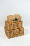 Two Fortnum and Masons wicker hampers and a smaller example,