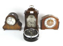 Three 20th century mantle clocks and a circular wall clock,