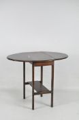 A 20th century mahogany drop leaf table,