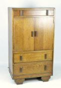 An early/mid-20th century oak cupboard,
