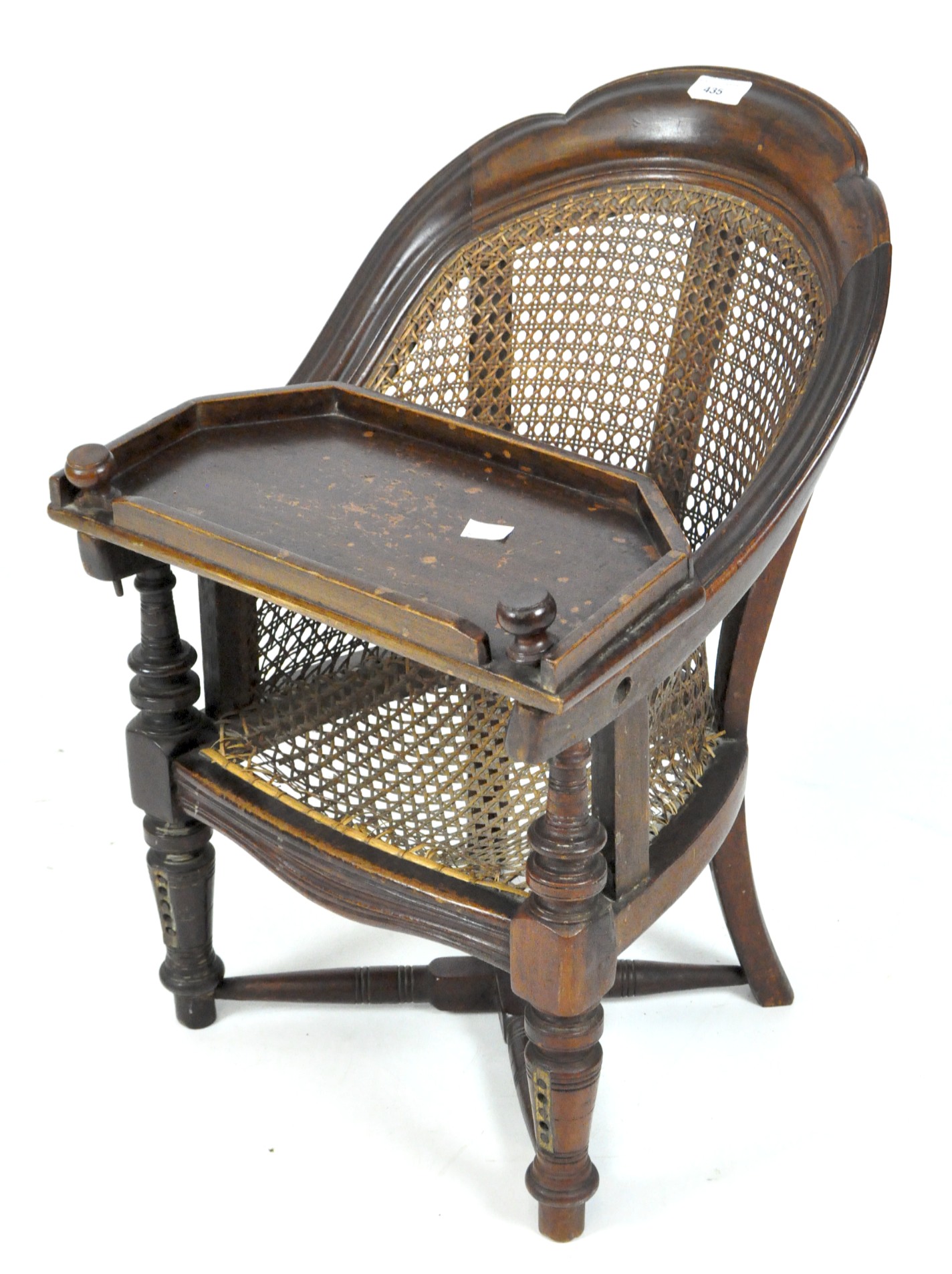 A late 19th/early 20th century child's chair with Bergere seat and back,