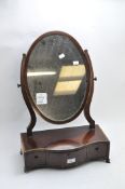 A early 19th century mahogany dressing table mirror,