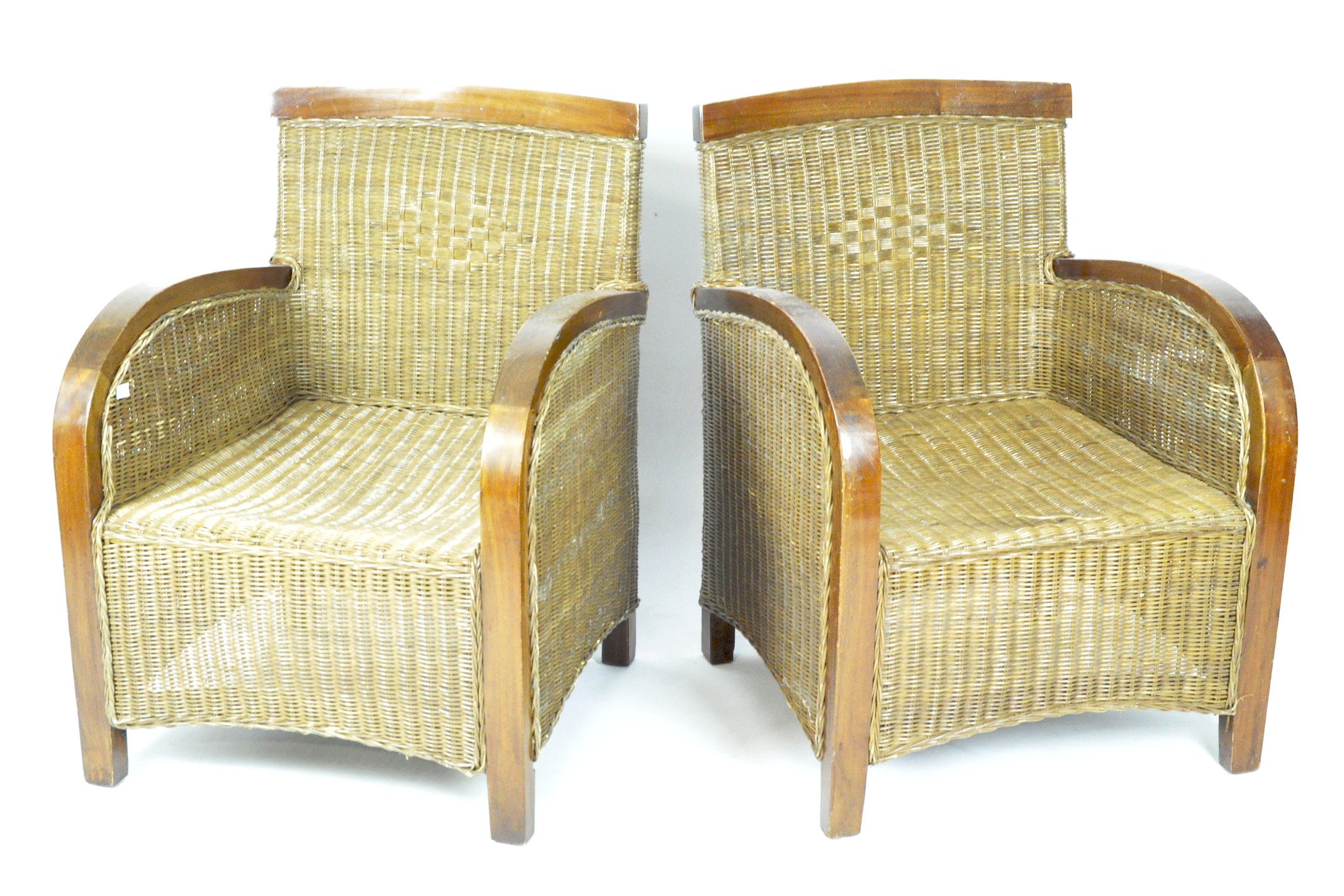 A pair of 20th century armchairs with wicker seats