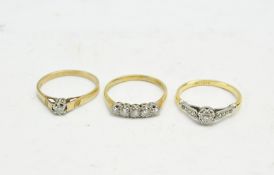 Three 20th century diamond set dress rings, including a 9ct solitaire ring,