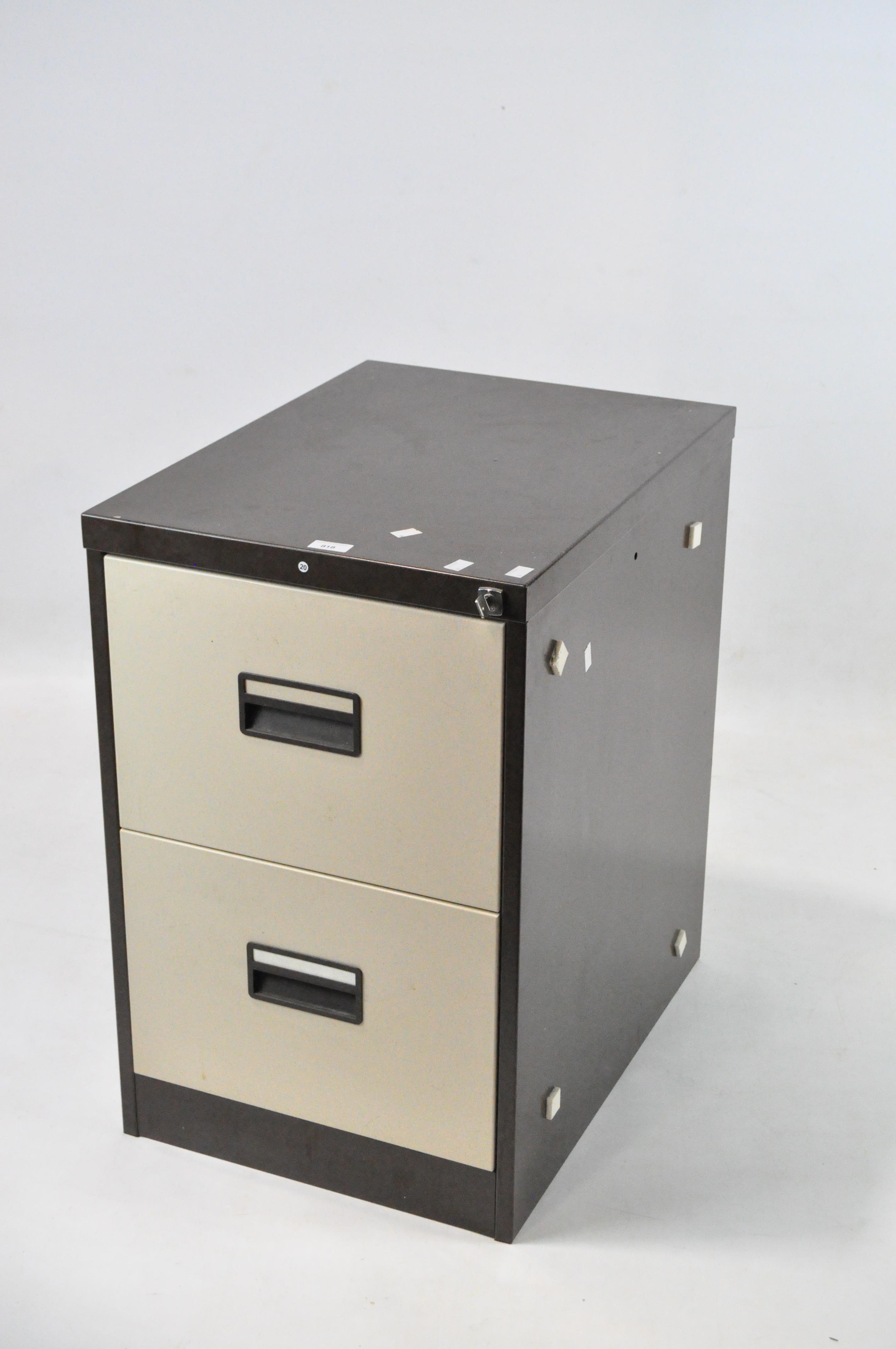 A two drawer metal filing cabinet in brown and beige,