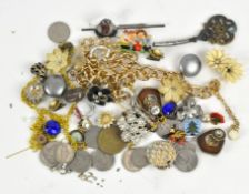 A selection of assorted costume jewellery and coins