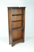 Contemporary dark stained bookcase with four shelves,