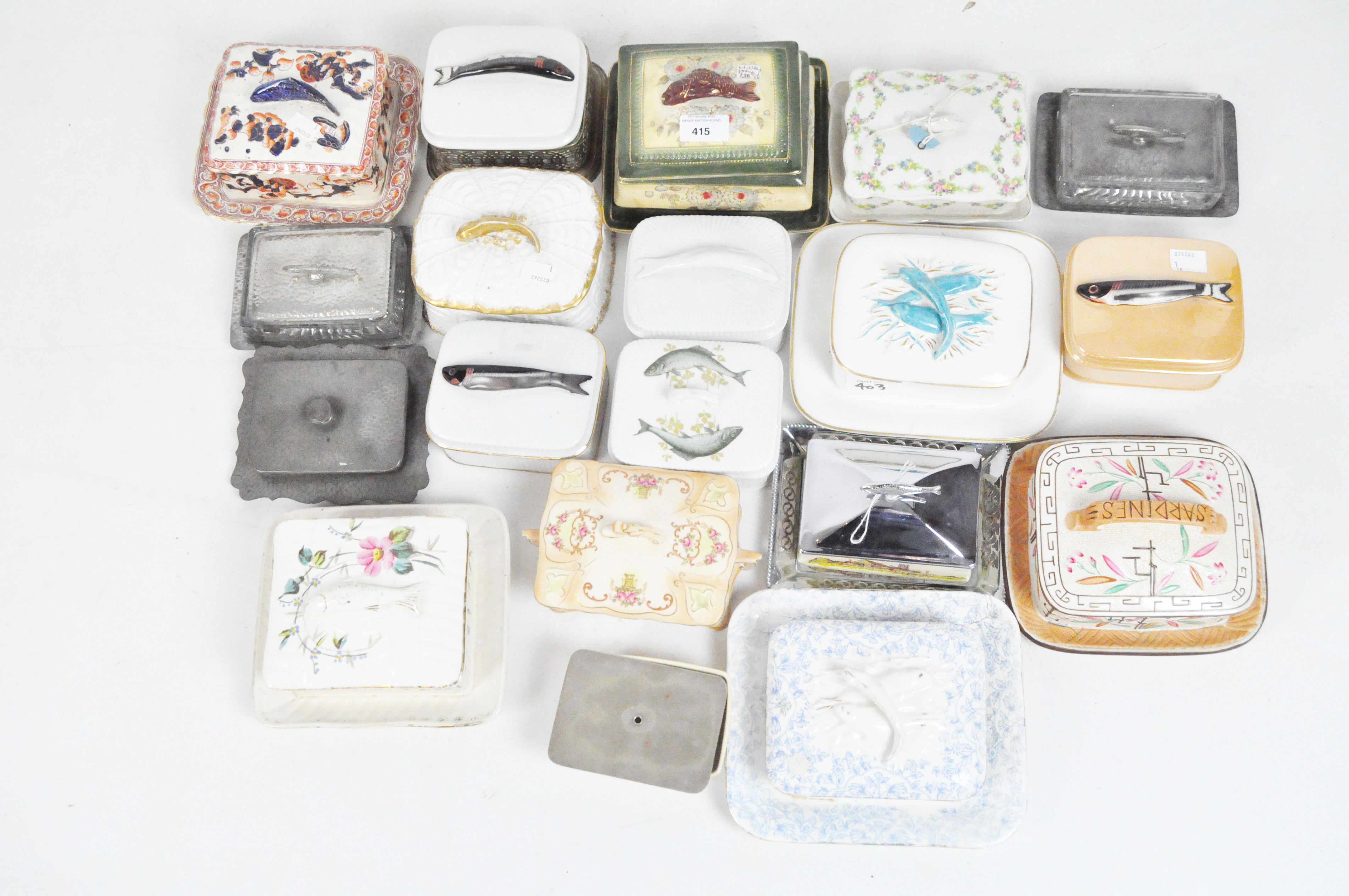 Nineteen sardine boxes and covers, 19th century and later, in ceramic, glass and pewter,