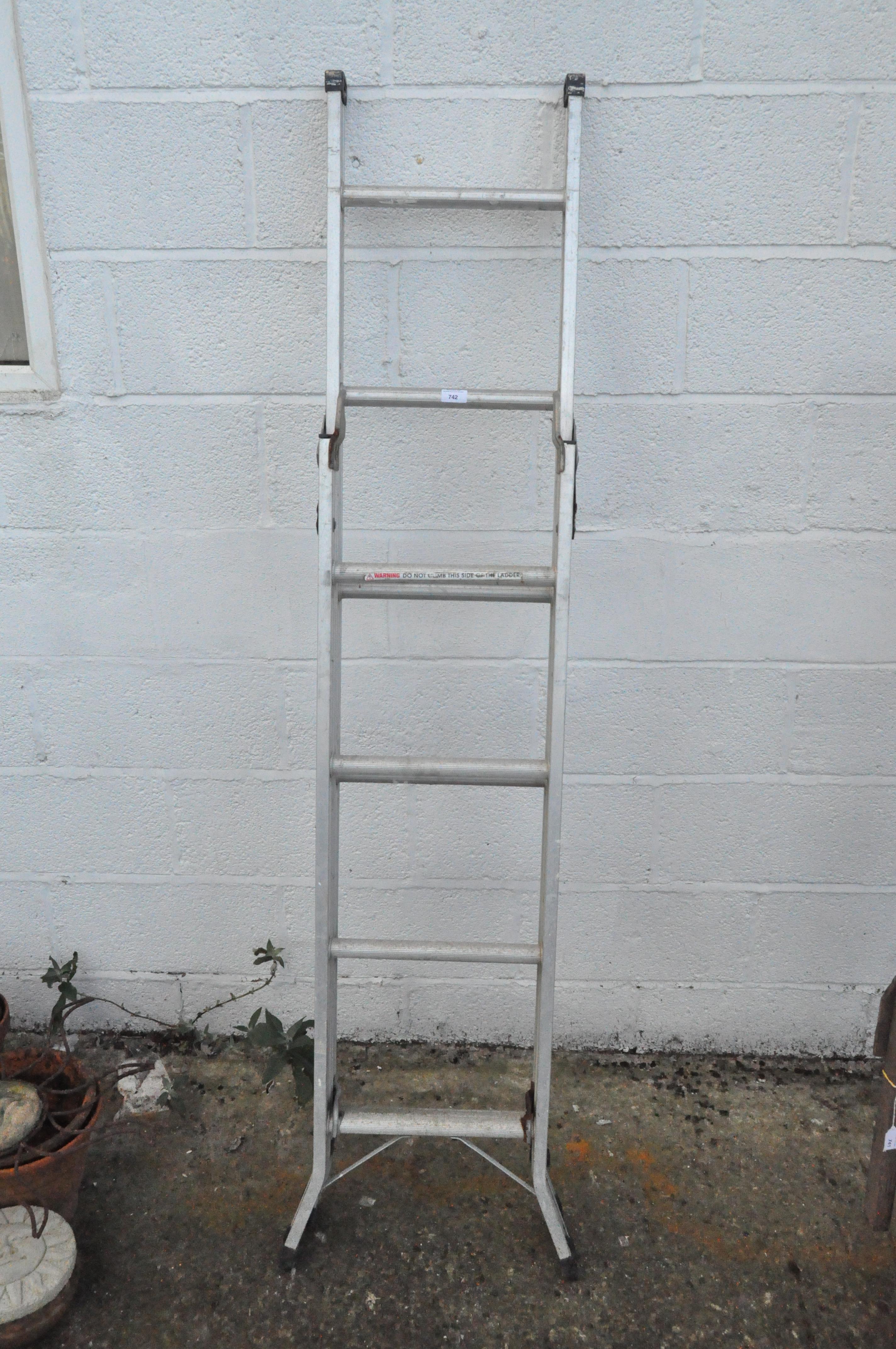 A metal six rung stepladder,