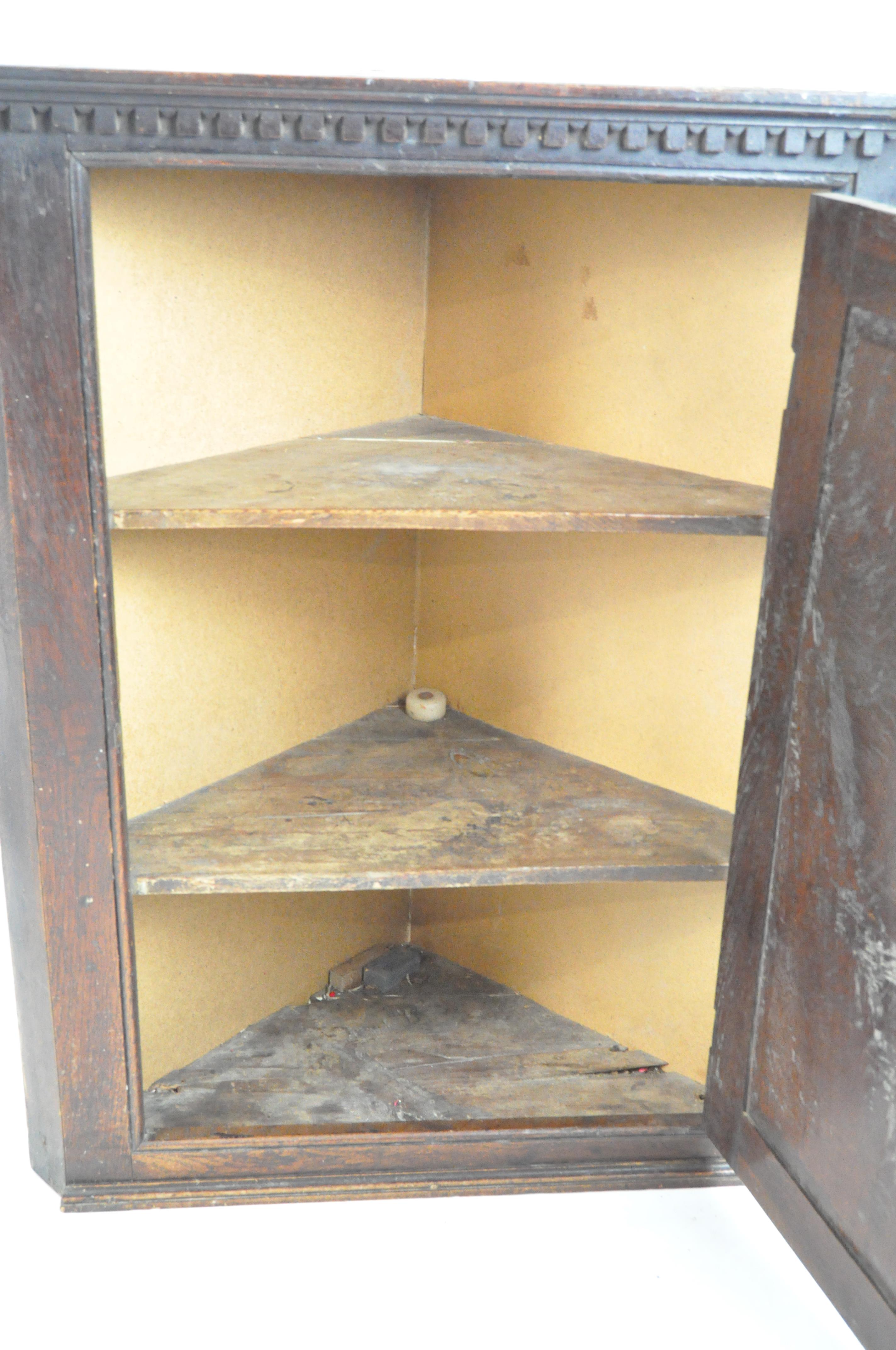 A Georgian oak corner cupboard, - Image 2 of 2