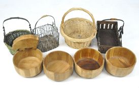 A selection of wicker baskets and wooden bowls,