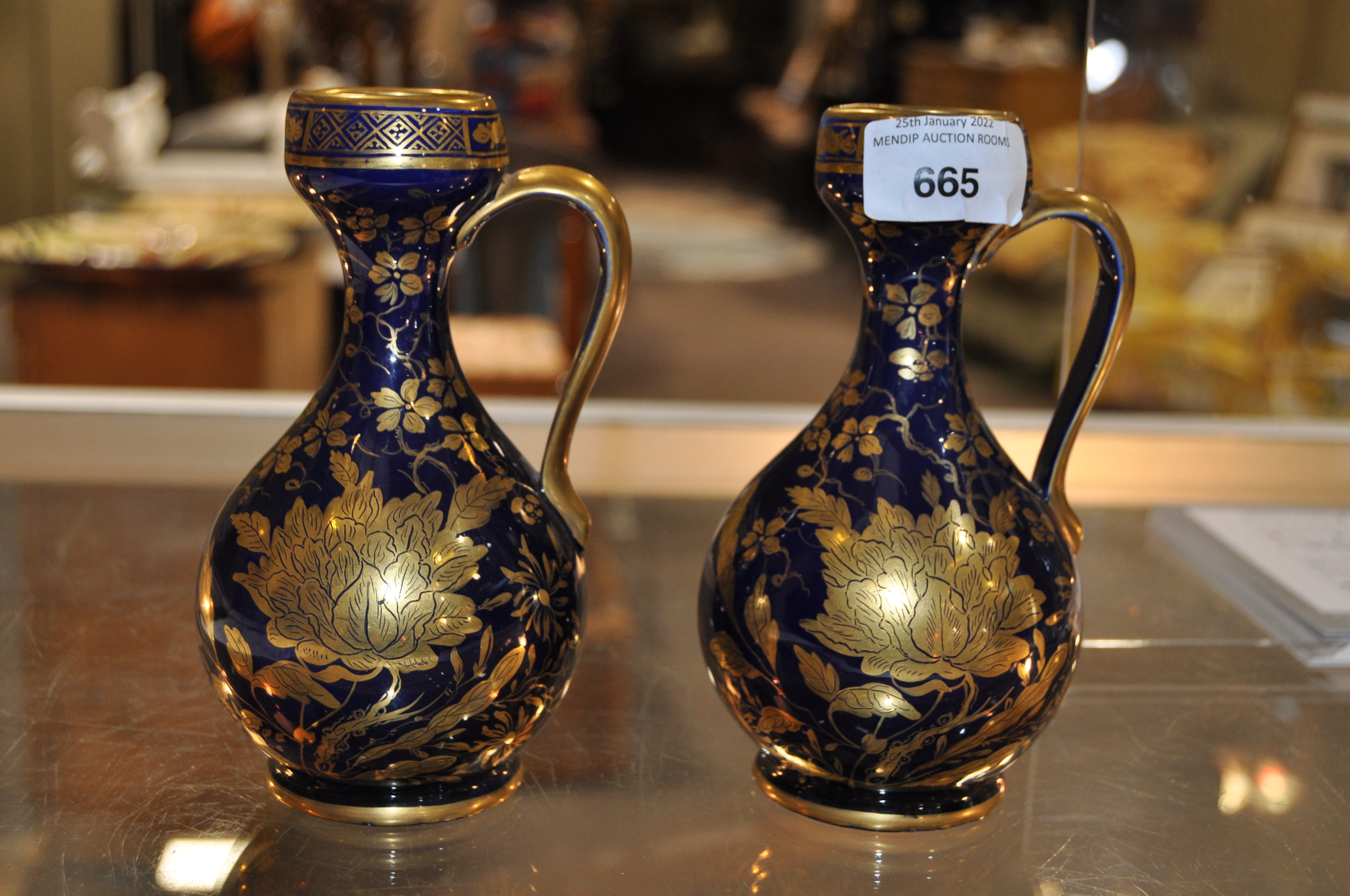 A pair of 19th century Staffordshire glazed ceramic ewers, - Image 5 of 7