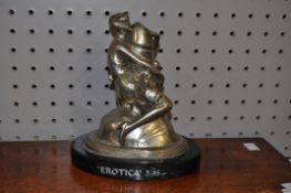 A metal sculpture, titled 'Erotica', in chromed finish, signed B.Zach