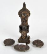 A carved Chinese/Tibetan wooden tribal figure, height 24cm,