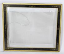 An early 20th century black and gilt frame picture frame in the Aesthic movement style,