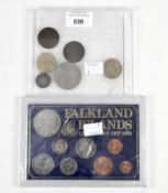 A selection of coins, most being GB,