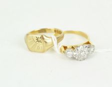 Two 20th century rings, the first a yellow metal and diamond chip ring, the second a 9ct gold ring,