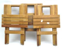 Three small folding wooden picnic tables,