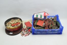 A quantity of vintage toy farm animals and Lott's Bricks train station