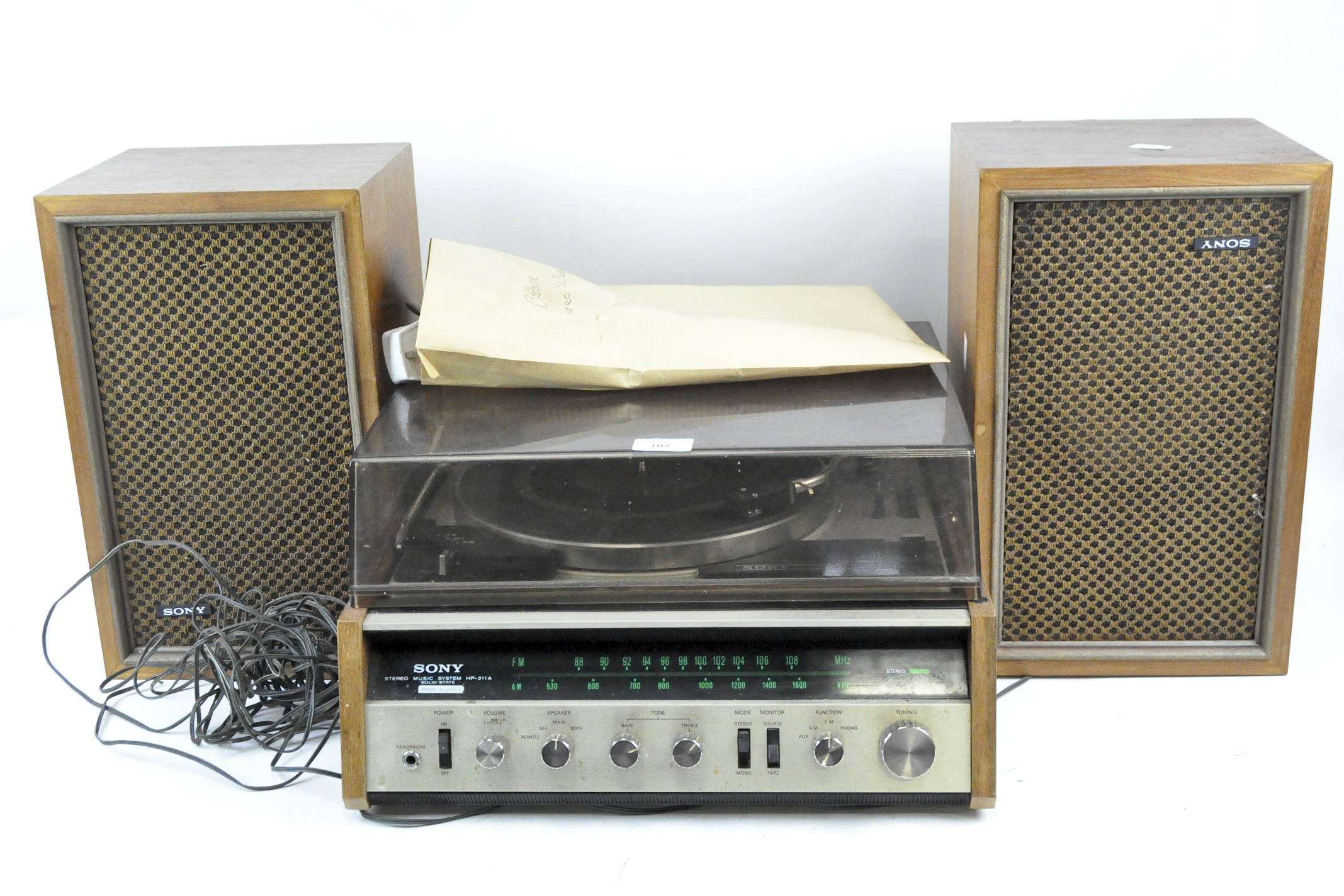 A Sony Stereo Music System and two Sony speakers,