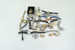 A collection of fashion watches and parts.