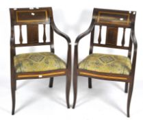 A pair of inlaid mahogany armchairs