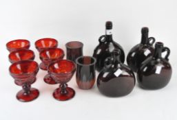 A collection of coloured glassware,