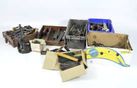 An extensive collection of tools and components, including wrenches, clamps and more,