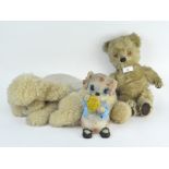 A vintage poodle soft toy, a teddy bear and a plastic dog