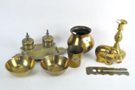 A selection of brassware,