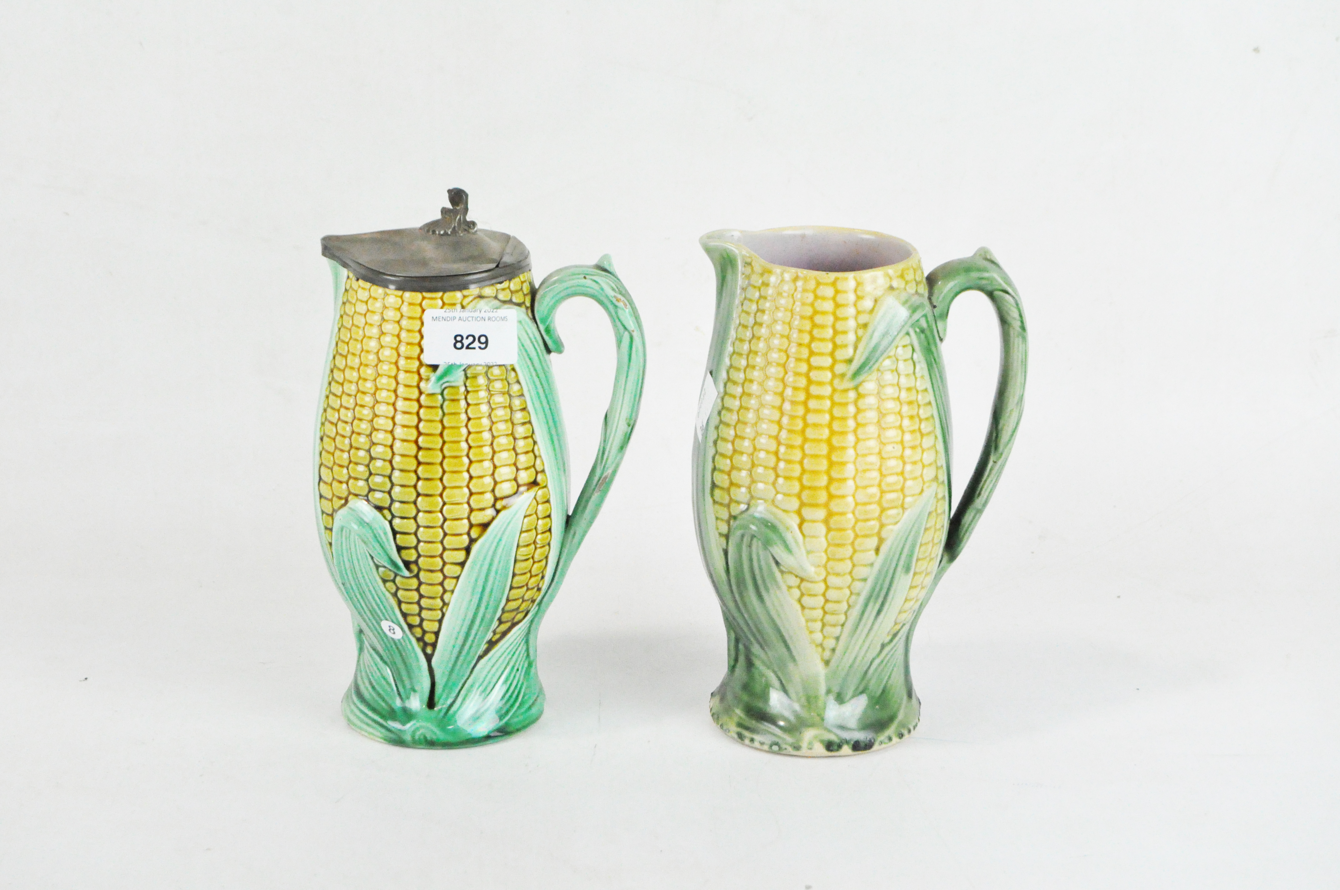 Two English majolica vases in the shape of corn cobs,