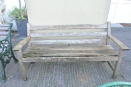 A vintage slatted garden bench,