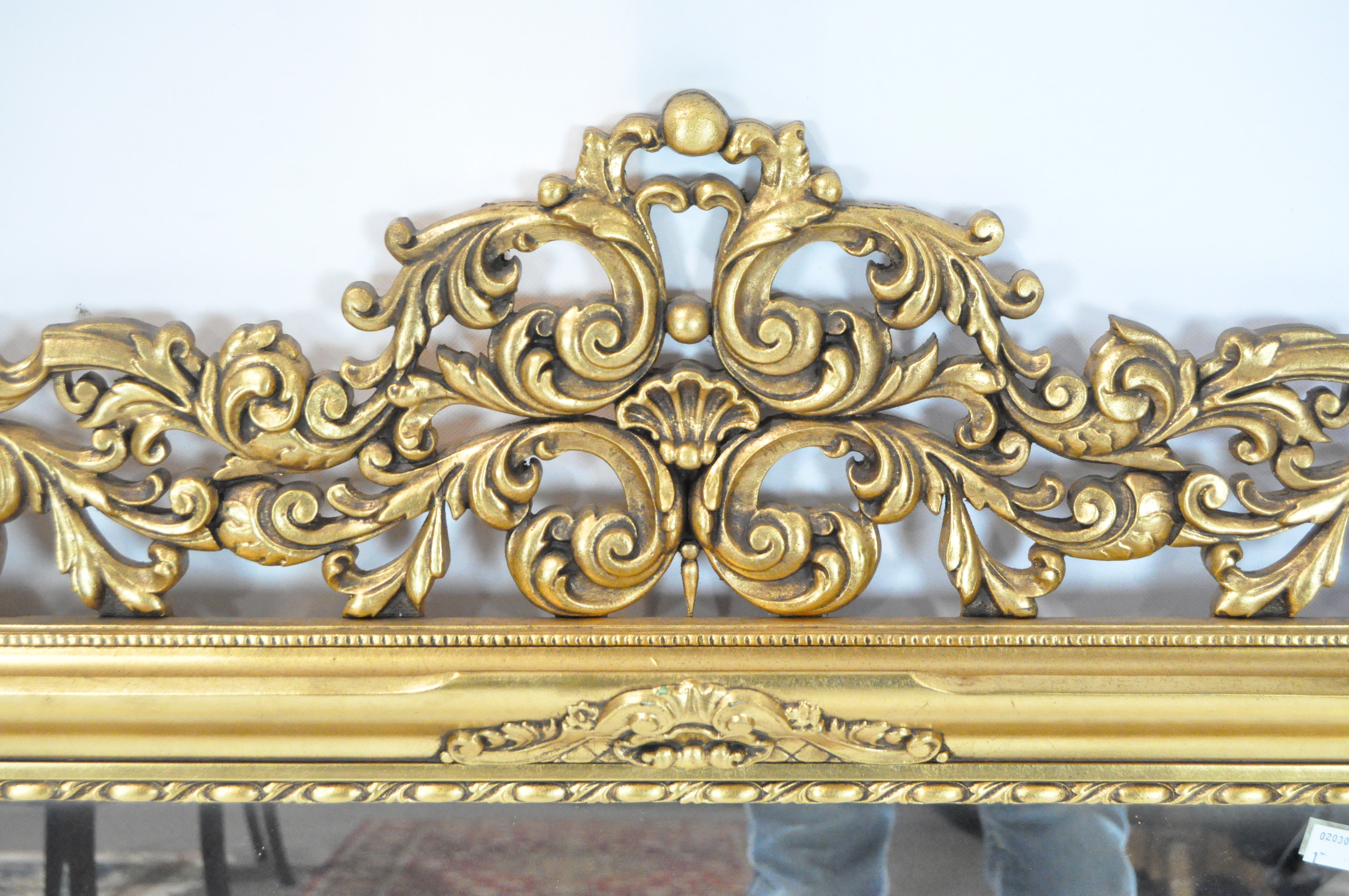 A large contemporary gilt framed wall mirror, featuring an ornate pierced frame, - Image 2 of 3