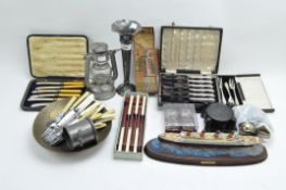 Assorted collectables and silver plate including cutlery and a model Titanic,