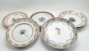 A collection of large decorative ceramic plates,