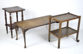 An oak two-tier trolley and two tables,