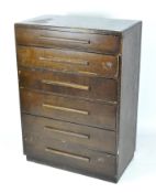 An early 20th century stained oak chest of drawers,