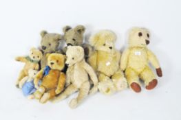 A group of eight teddy bears including four by Merrythought and one by Merrythought for Harrods,