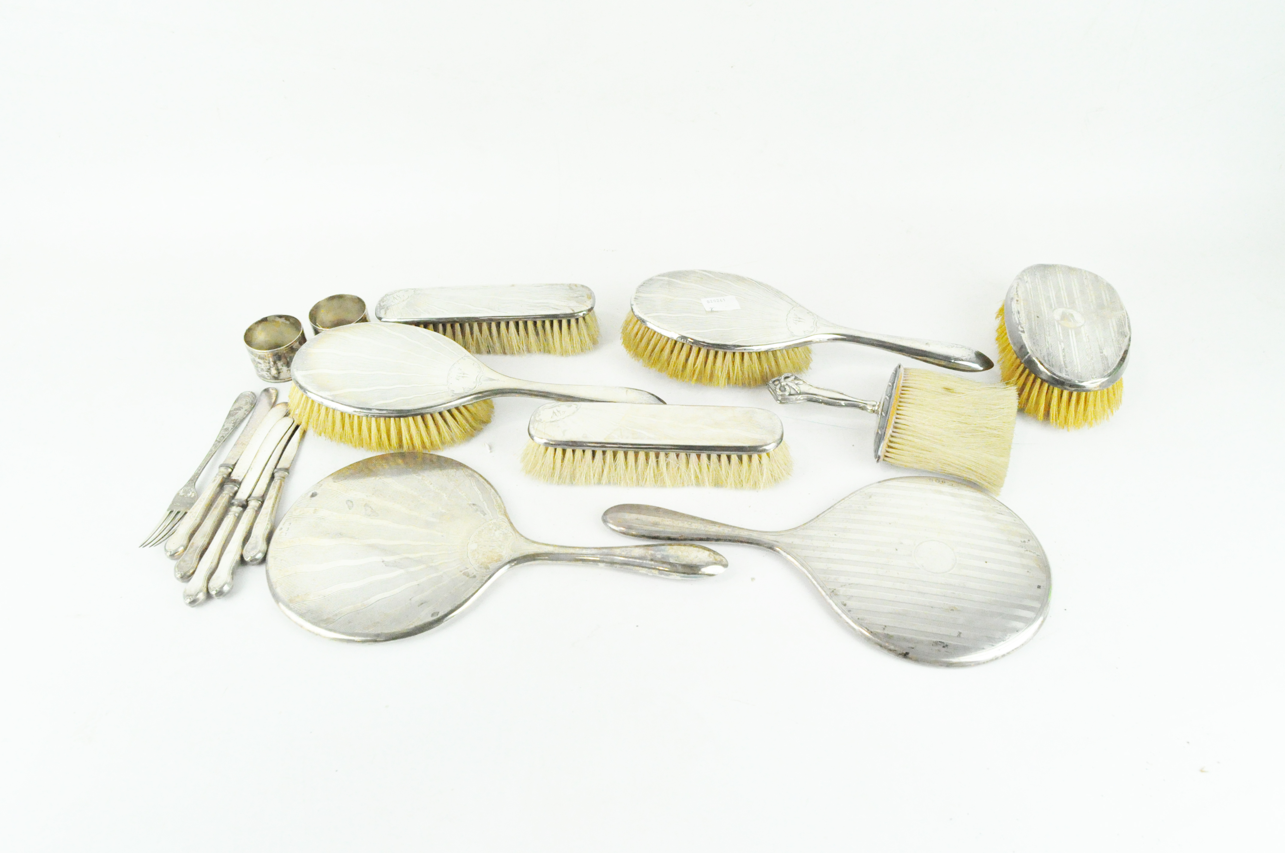 A collection of early 20th century silver dressing table wares,