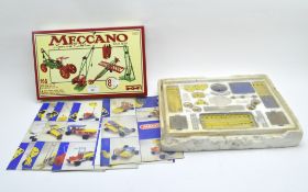 A selection of vintage Meccano, spread over two boxes,