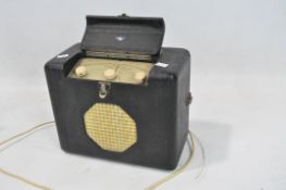 A vintage black Roberts radio,