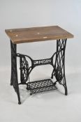 A vintage Singer sewing machine stand,