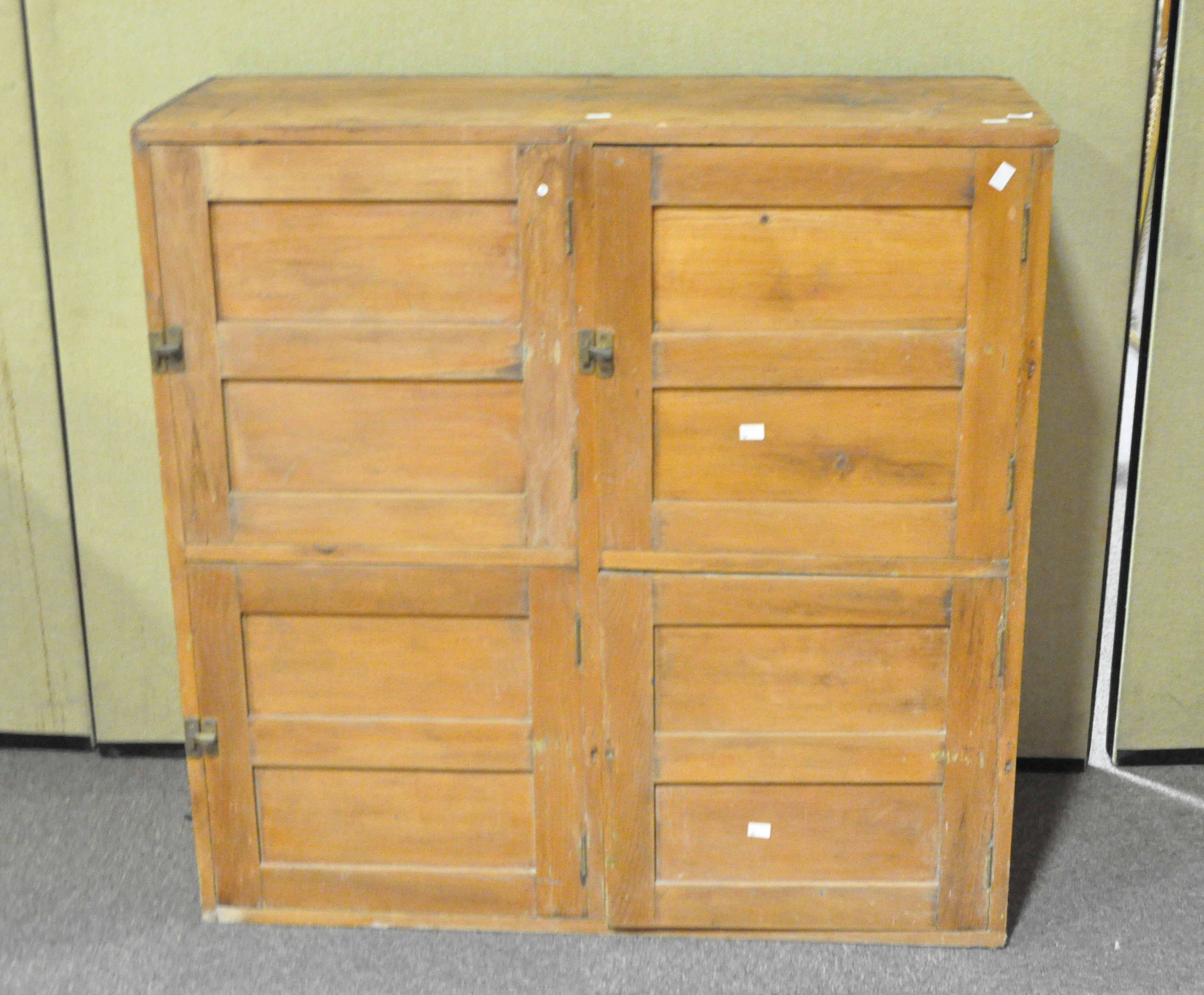 A pine panelled cupboard,