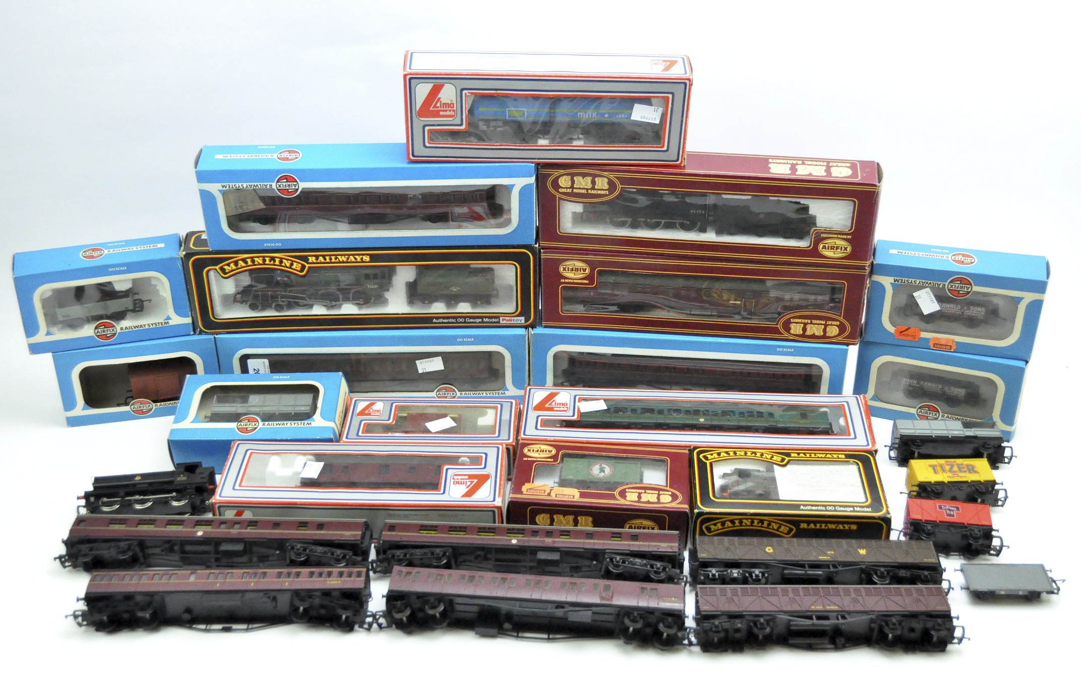 A collection of assorted OO scale locomotives and carriages,