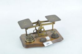 A vintage set of brass postal weighing scales,