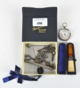 An assortment of silver and white metal wares, to include a 935 grade silver fob watch,